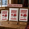 Canadian Apology Starter Pack prank displayed as a DIY sticker label, a 6 × 9 bubble mailer and a 6 × 9 mailing box in a cozy Canadian setting.