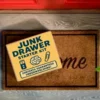 Junk Drawer Starter Kit prank label on a cardboard shipping box
