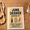 Junk Drawer Starter Kit prank mailer package from TheOneAndOnly.ca on a wooden table beside coffee and car keys