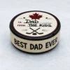 Personalized hockey puck reading To Dad, From the Kids on top and Best Dad Ever around the side.