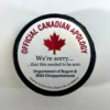 Official Canadian Apology custom hockey puck with humorous apology message.