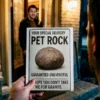 First person perspective holding a "Pet Rock - Guaranteed Uneventful" card on a porch with a man smiling in the doorway.