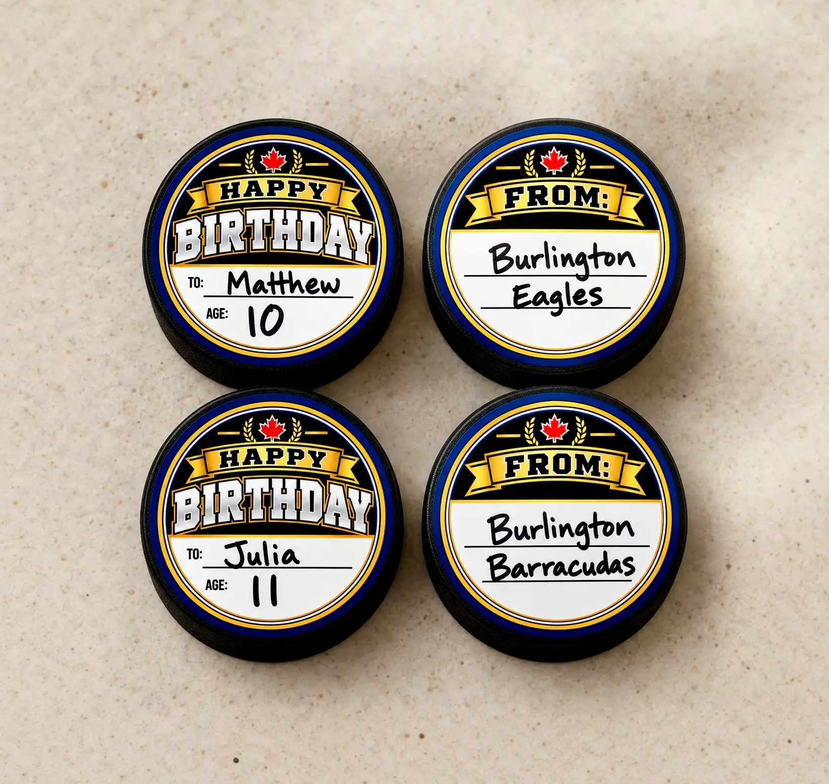 Happy Birthday hockey puck stickers personalized with player names, ages and team names