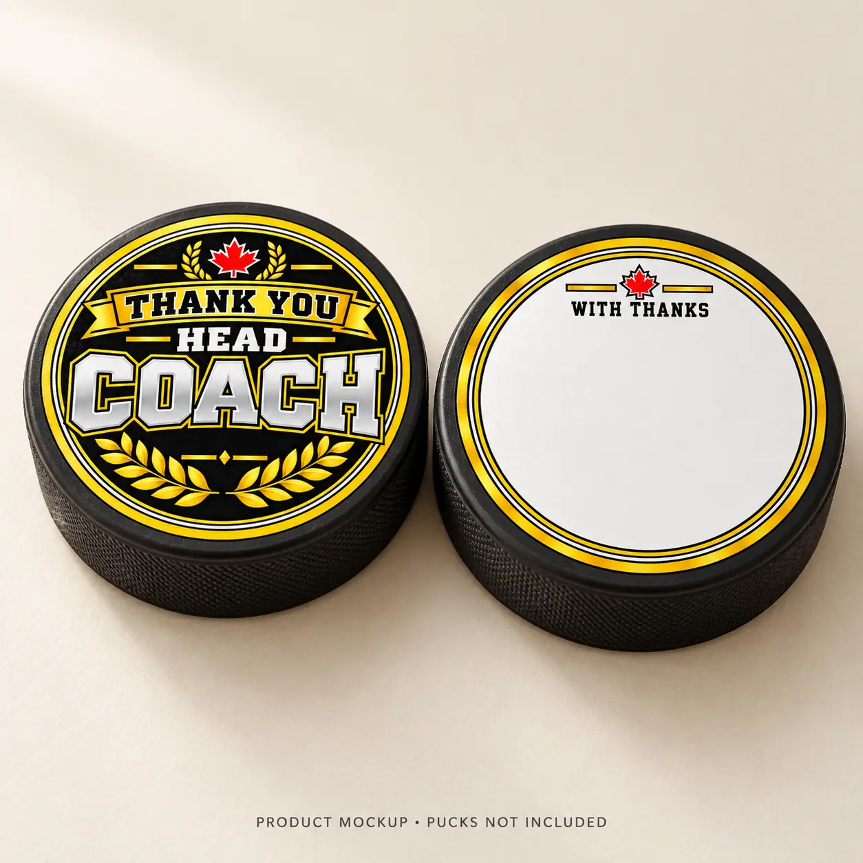 Black and gold hockey thank you stickers shown on pucks as finished gift examples