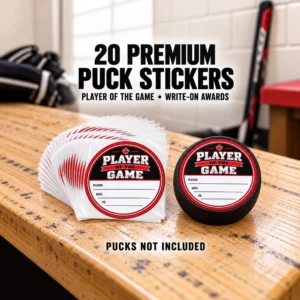 20 Player of the Game hockey puck stickers fanned beside a black puck displaying the red, black and white award design on a wooden locker room bench. Pucks not included.